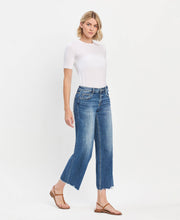 Load image into Gallery viewer, MID RISE MEDIUM DARK WASH RAW HEM WIDE JEANS vervet