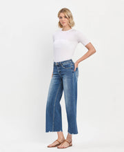 Load image into Gallery viewer, MID RISE MEDIUM DARK WASH RAW HEM WIDE JEANS vervet